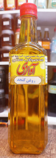 روغن کنجد خوراکی اصل پرس سرد با رنگ طلایی مناسب مصرف روزانه و پختوپز سالم